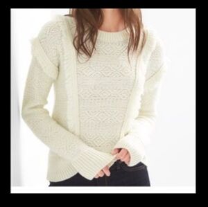 Gap sweater with the fringes going down the front and the fringes on the…